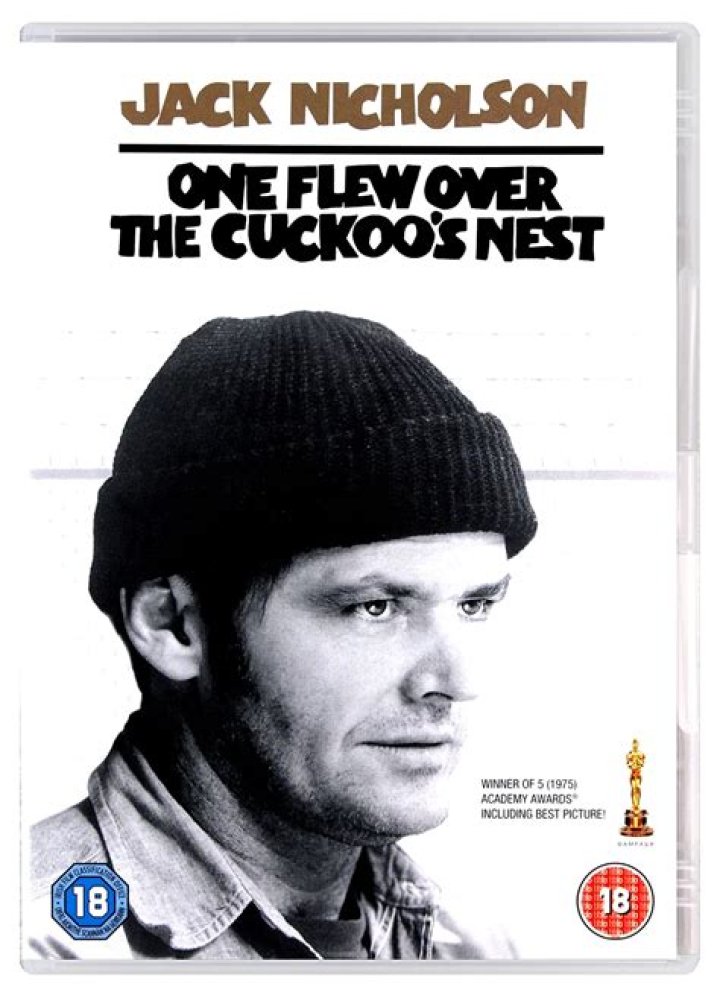 What does the glass symbolize in One Flew Over the Cuckoo's Nest?